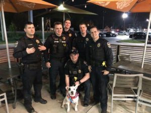 Louisville police officers with buddy