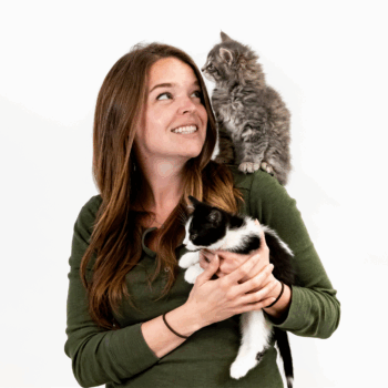 Dr. Jacklyn Ellis holding two cats