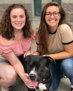 two girls with foster dog