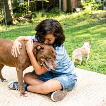 boy in yard w dogs 02 copy 350x350 - Pets and People photos is now Images With HeART