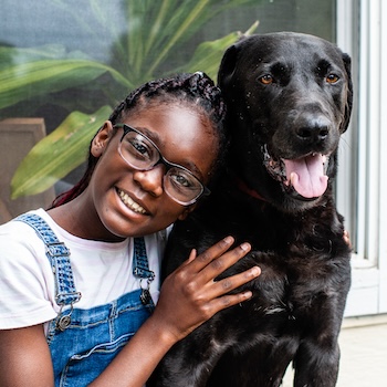 girl dog smiling blog - Join CARE for its 4th Annual American Black History Series