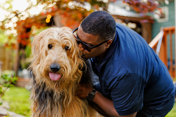 heartsspeak dog and man copy - PetsAndPeoplePhotos.org helps animal welfare organizations deepen community connections